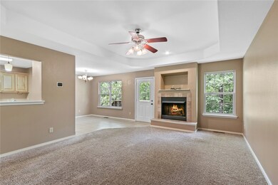 Living room is open to the dining room and kitchen.