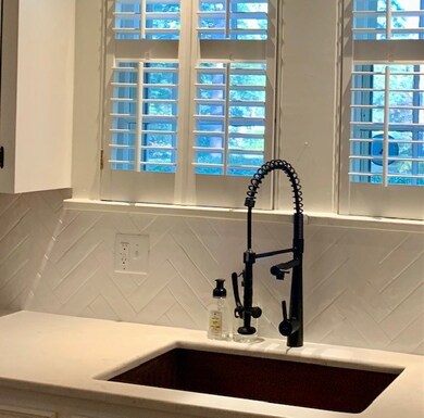 new herringbone tile backsplash