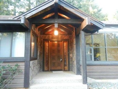 Attractive covered entry with etched glass side wi