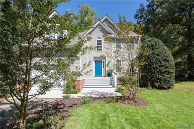 View of front of house with a front yard
