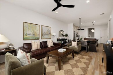 Living area featuring recessed lighting, a ceiling fan, and light wood-type flooring
