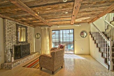 Stately Masonry Fireplace in Living Room. Sliding 