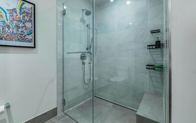 Bathroom with a stall shower