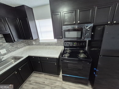 4701 Flat Shoals Rd unit 34-H, Union City, GA 30291 - photo 6