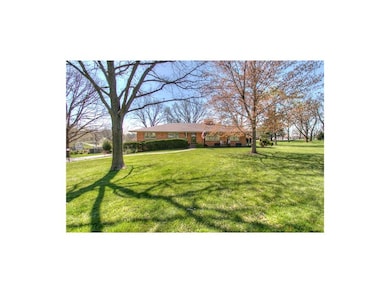 All brick home on 1.31 acres, surrounded by mature