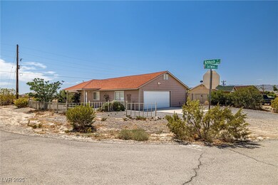 Single story home featuring fence and concrete dri