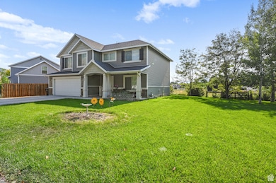 Craftsman-style home featuring concrete driveway, an attached garage, roof with shingles, and a porch
