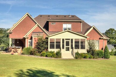 ENJOY FAMILY TIME OR ENTERTAINING ON THE LARGE SCREENED PORCH