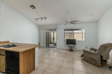 5) FAMILY ROOM - KITCHEN