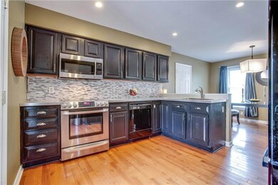 Nice workable kitchen with a good amount of prep space!