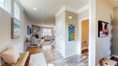 What a clean and bright entryway to welcome guests