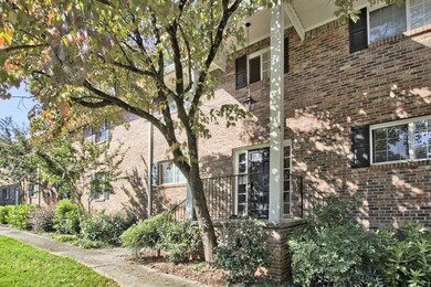 View of side of home with brick siding