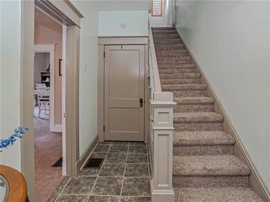 Entry with ceramic tile floor
