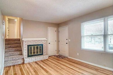 Living Room. main level with fireplace and brand n