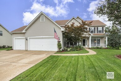 Three Car Garage and Spacious Concrete Driveway.