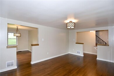 Living Room: Open Floor Plan to the Dining Room