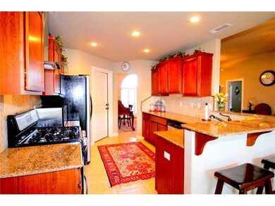 Kitchen. Kitchen is to die for w/ beautiful granite counter tops and stainless appliances!