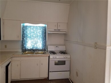 Unit#2 - kitchen features gas stove and room for a