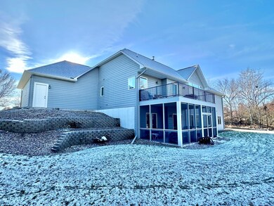 Metal railings and maintenance free decking above with ceiling in the screen porch to carry water outside giving a dry bug free environment below.