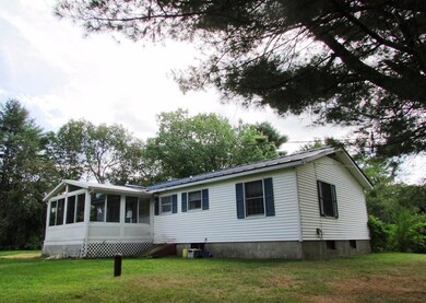 View from the back and side yard. ...