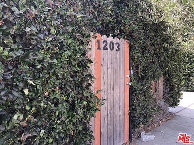 Entrance to 1203 is on 12th