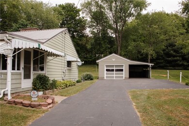 Paved driveway leads to