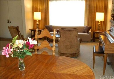 View from dining room into living room toward fron