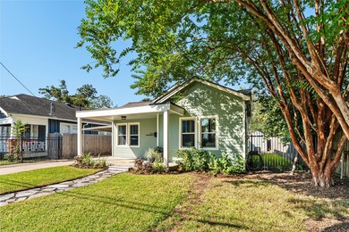 Charming updated bungalow with a covered front por