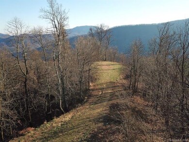 Drone shot of flat access drive to build pad