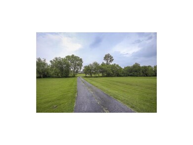 1405 Gore Rd, Raymore, MO 64083 - photo 2