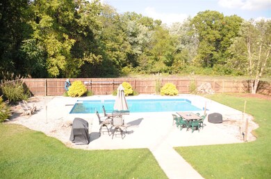 Deck spans entire length of back of house.