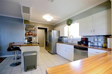 Kitchen with stainless steel appliances