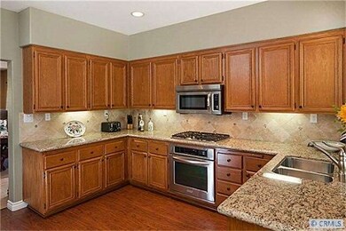 Refinished cabinets stainless steel appliances wit