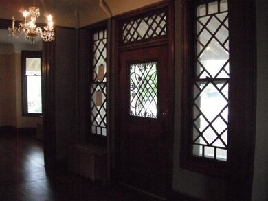 Entry showing beveled windows