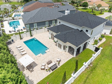 Aerial perspective of suburban area with a pool area