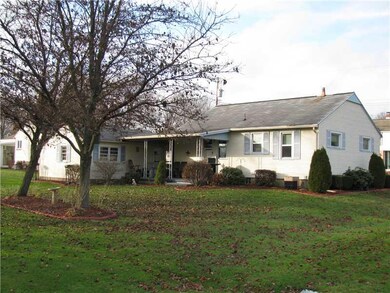 Exterior Back. Nice covered rear patio