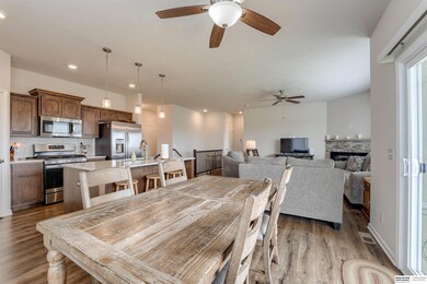 Dining area looking into kitchen. Very open for entertaining guests.