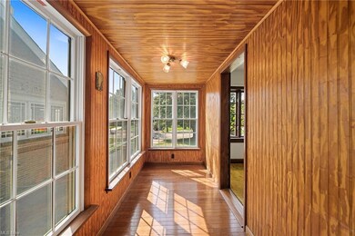 Sunroom with wooden ceiling