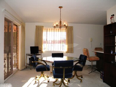 Dining area opens up to back yard