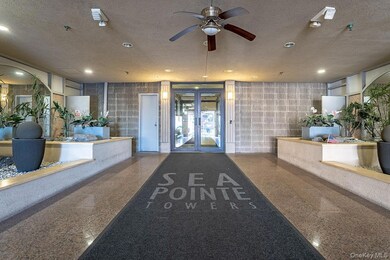 Reception featuring wallpapered walls, a textured ceiling, ceiling fan, recessed lighting, and french doors