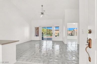 Spare room featuring a ceiling fan and crown molding