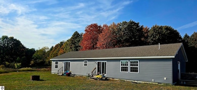 303 Westwood Rd NW, Alden, MI 49612 - photo 2