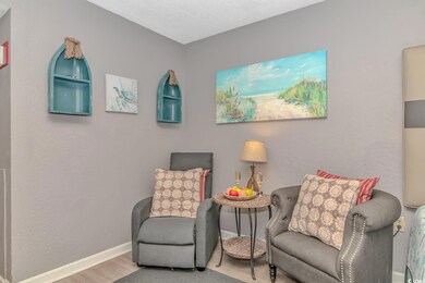 Sitting room featuring hardwood / wood-style floor
