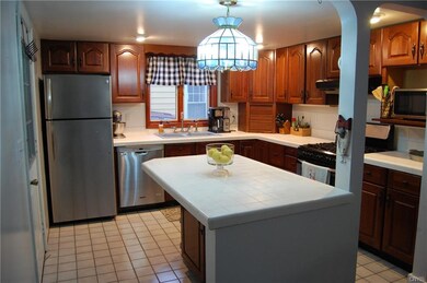 Light, bright kitchen with large island.