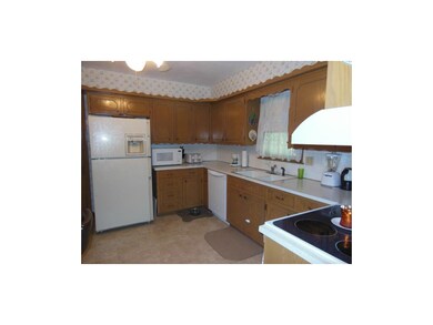 Open, eat-in kitchen.