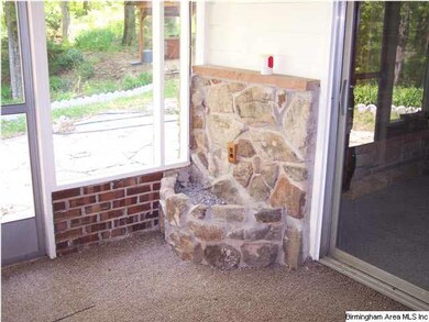 Rock flower planter in sun room