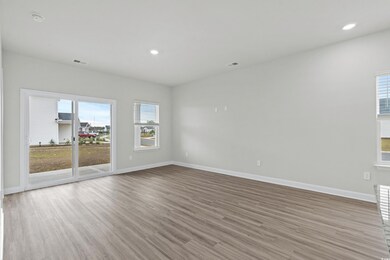 Unfurnished room with light hardwood / wood-style 