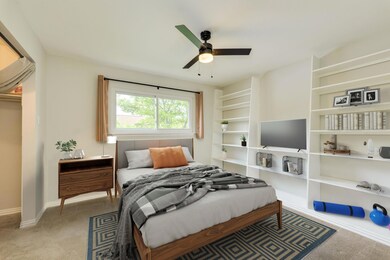 Carpeted bedroom featuring baseboards and ceiling