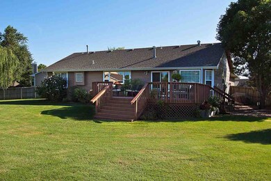 East facing, fully fenced backyard.