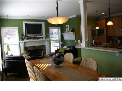 Kitchen with eat-in seating complete with fireplac